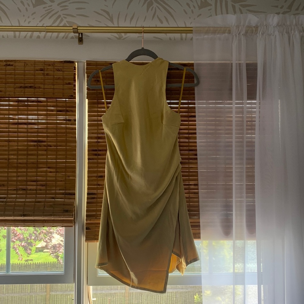 Brand new with tags size six/medium dress. Never worn light weight dress.